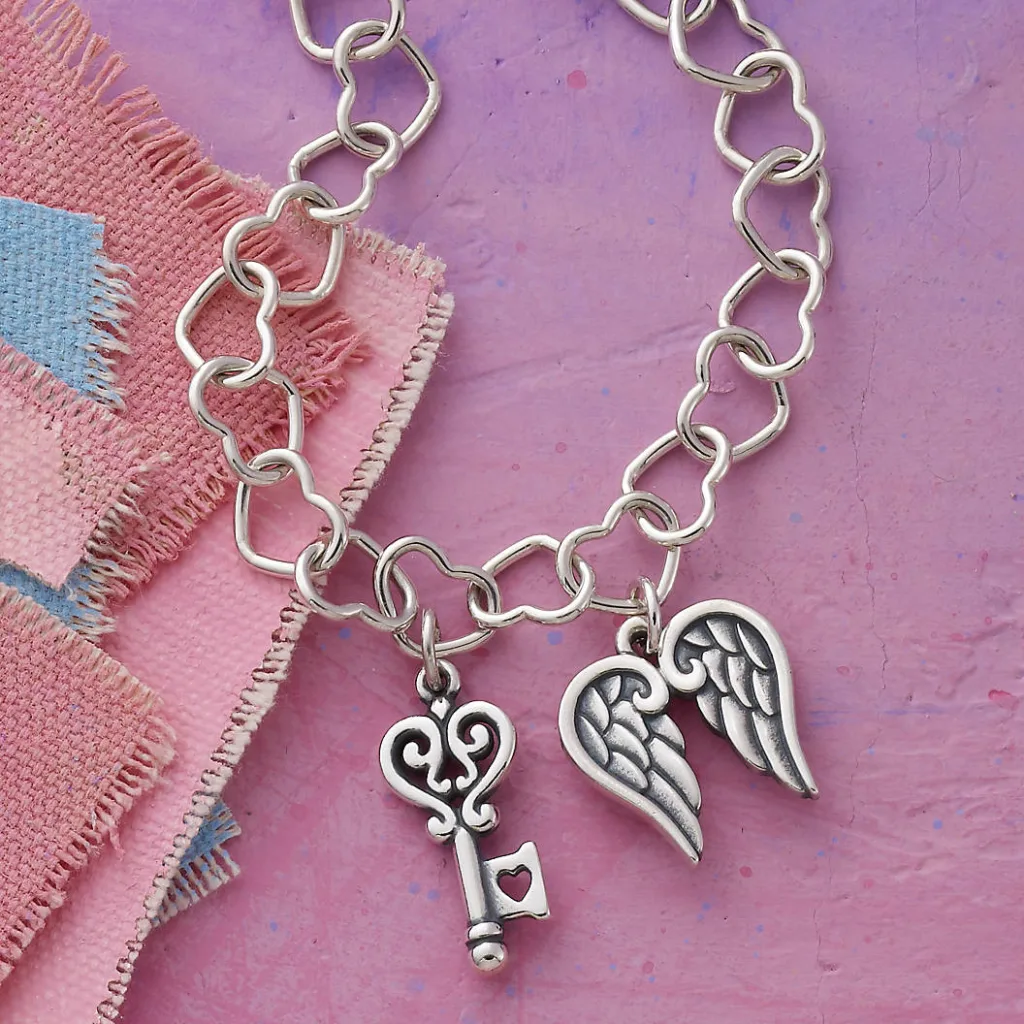 Creative adoption anniversary celebration ideas: Add to a collectible gift, like a charm bracelet, each year.