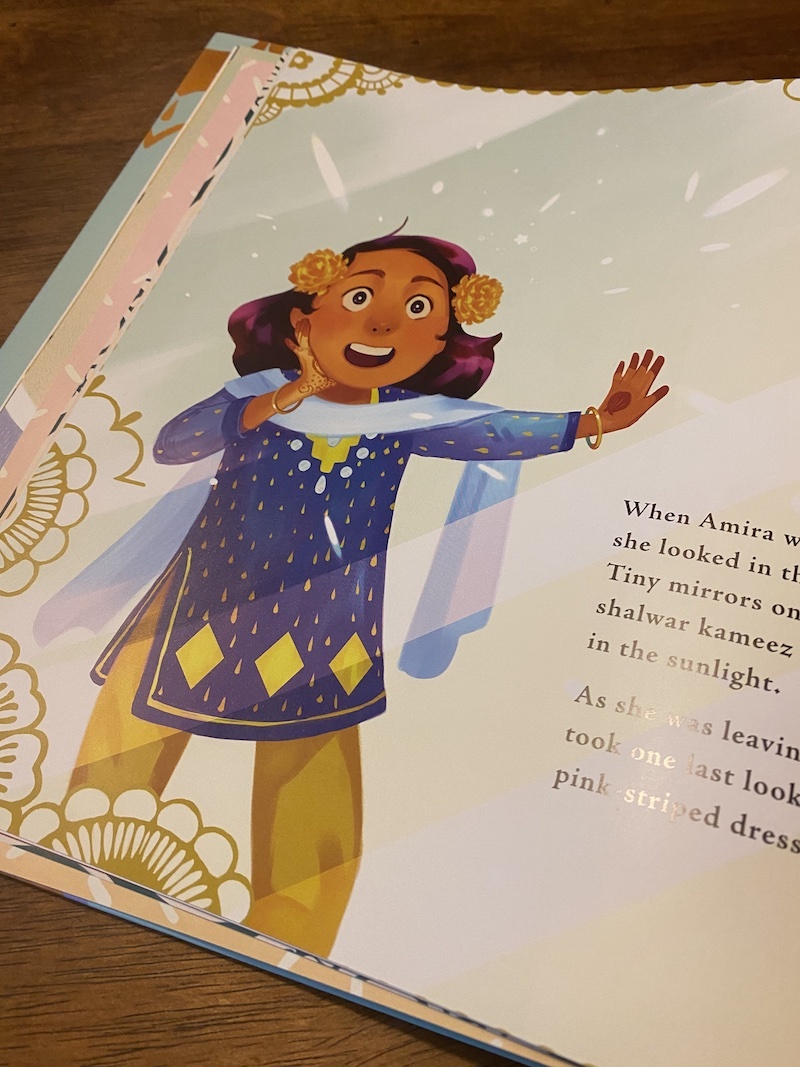 Amira's new clothes for Eid are so special, in Amira's Picture Day, a children's book about Eid