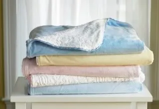 Buy one baby blanket and get two. The second, for a child who really needs it.