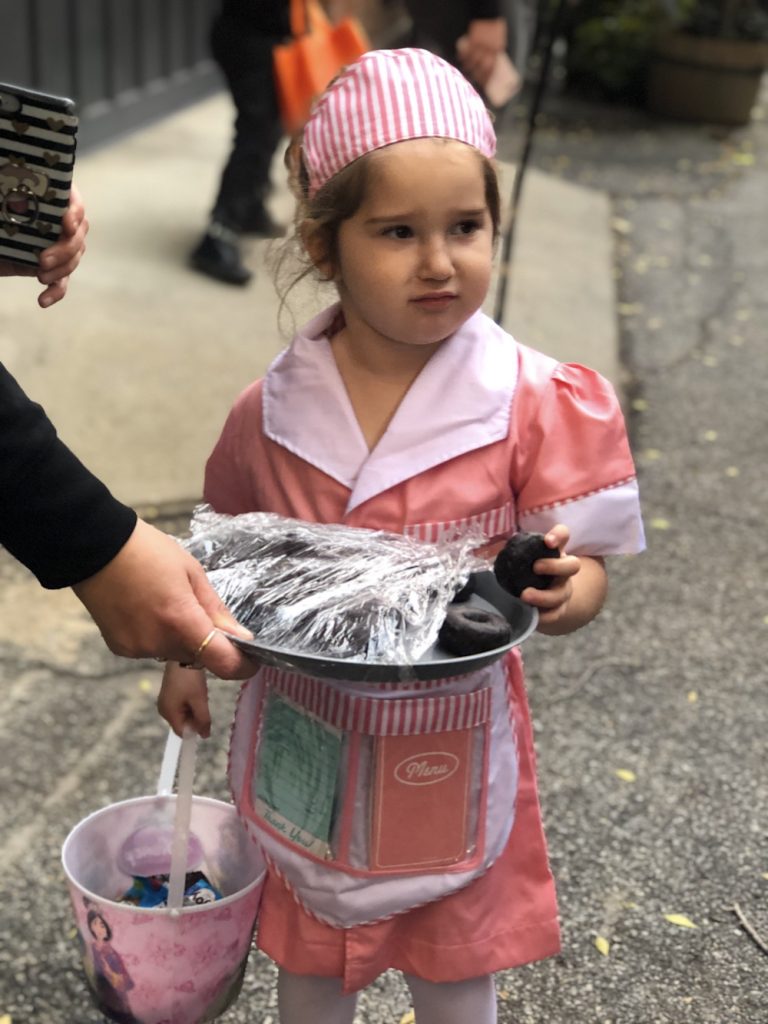 Best Garden Place, Brooklyn Halloween costumes 2018: Waitress handing out donuts | © Cool Mom Picks