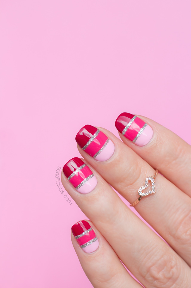 Valentine's Day nail ides: Pink striped glitter nails from So Nailicious | #valentinesnails