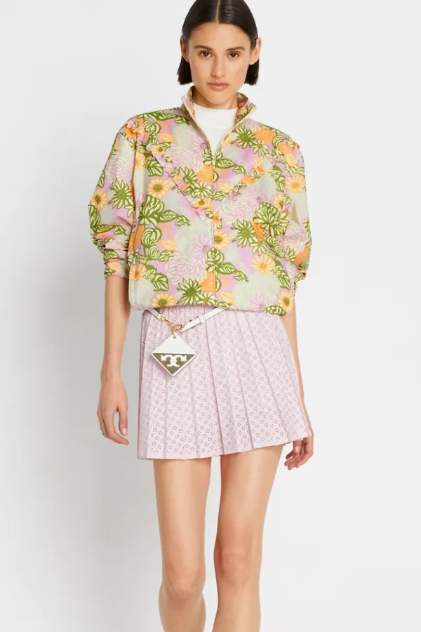 Tory Burch eyelet-inspired laser-cut tennis skirt on sale in pink and white
