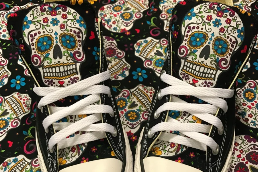 Cool hand-embellished sugar skull Converse Chuck Taylors on Etsy