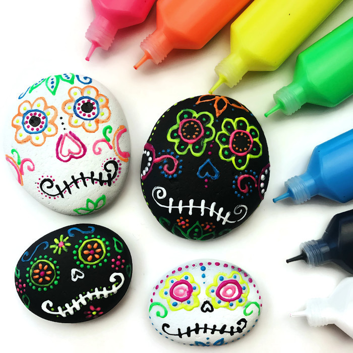 Sugar skull crafts | sugar skull painted rocks from Color Made Happy