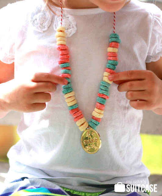 Olympics crafts for kids: cereal Olympic medals at My Sister's Suitcase