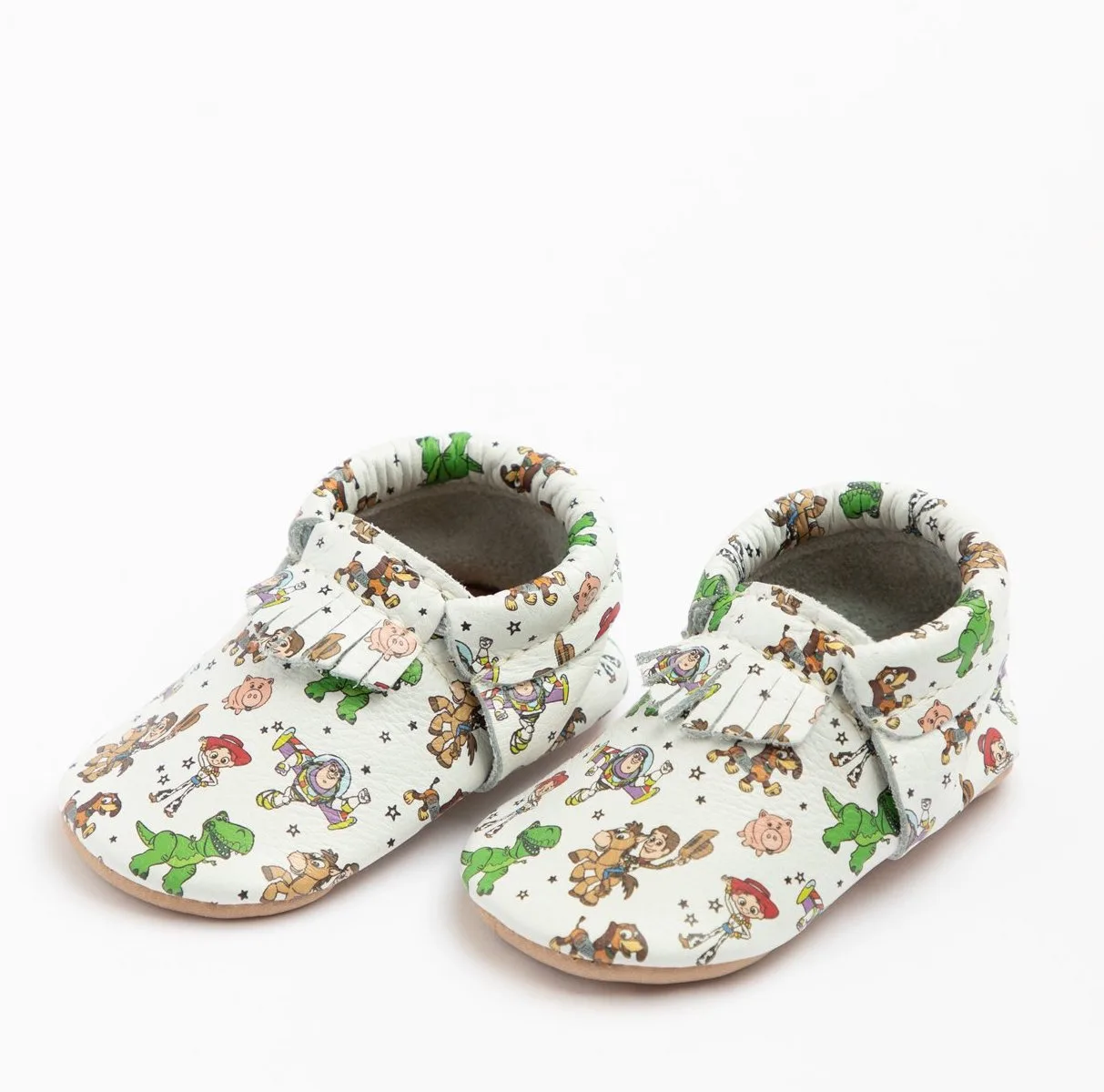 The new Toy Story baby mocs from Freshly Picked: 4 different styles featuring your favorite Toy Story characters