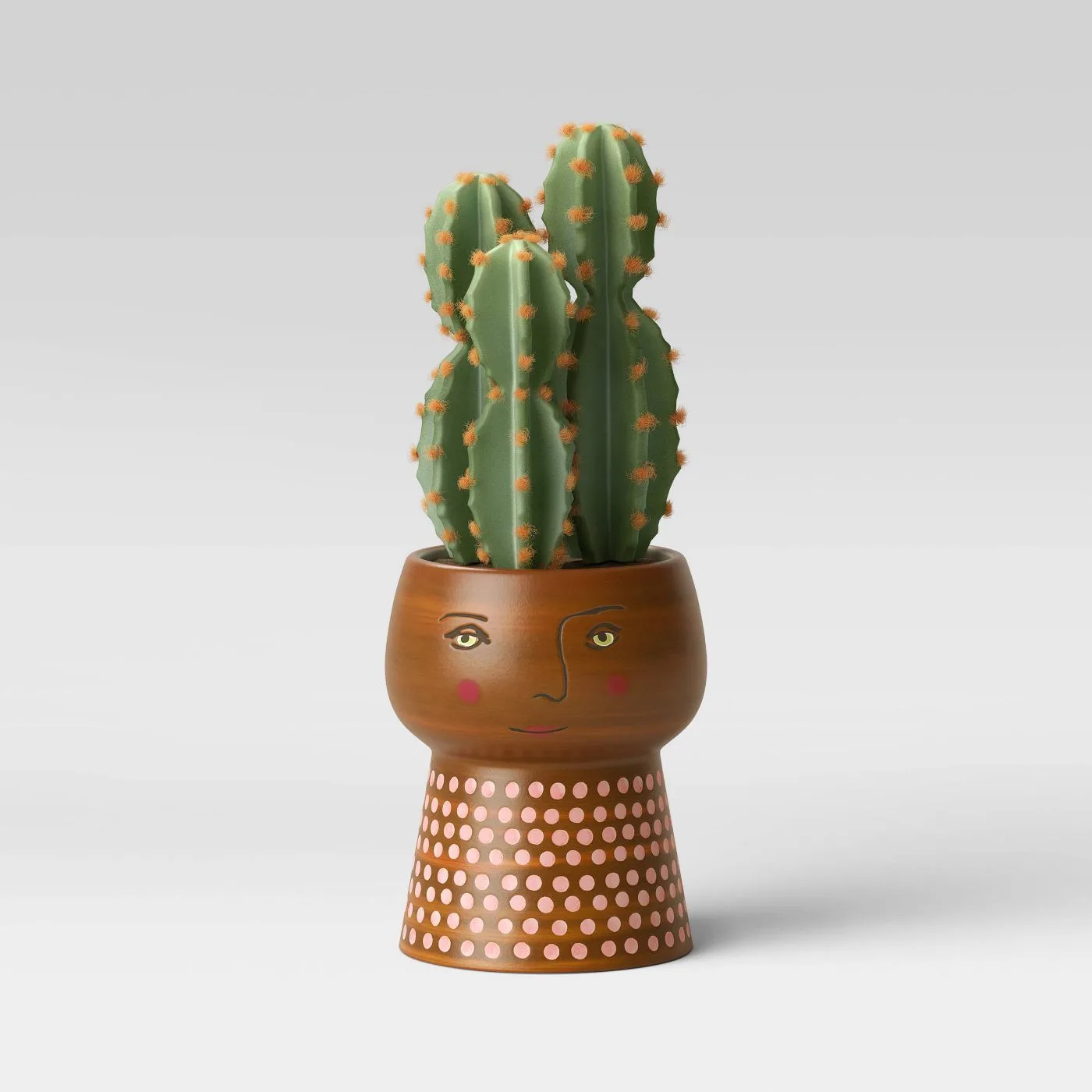 The best indoor planters to zhuzh up your living areas: Quirky "family" planters at Target