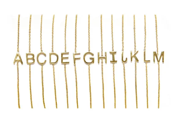 Custom jewelry for mom: Letter necklaces by Maya Brenner