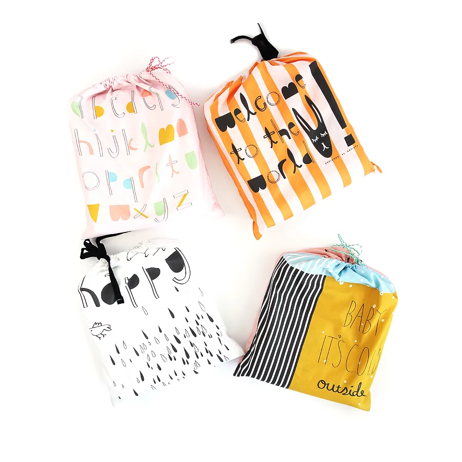 Handmade baby blankets in matching pouches