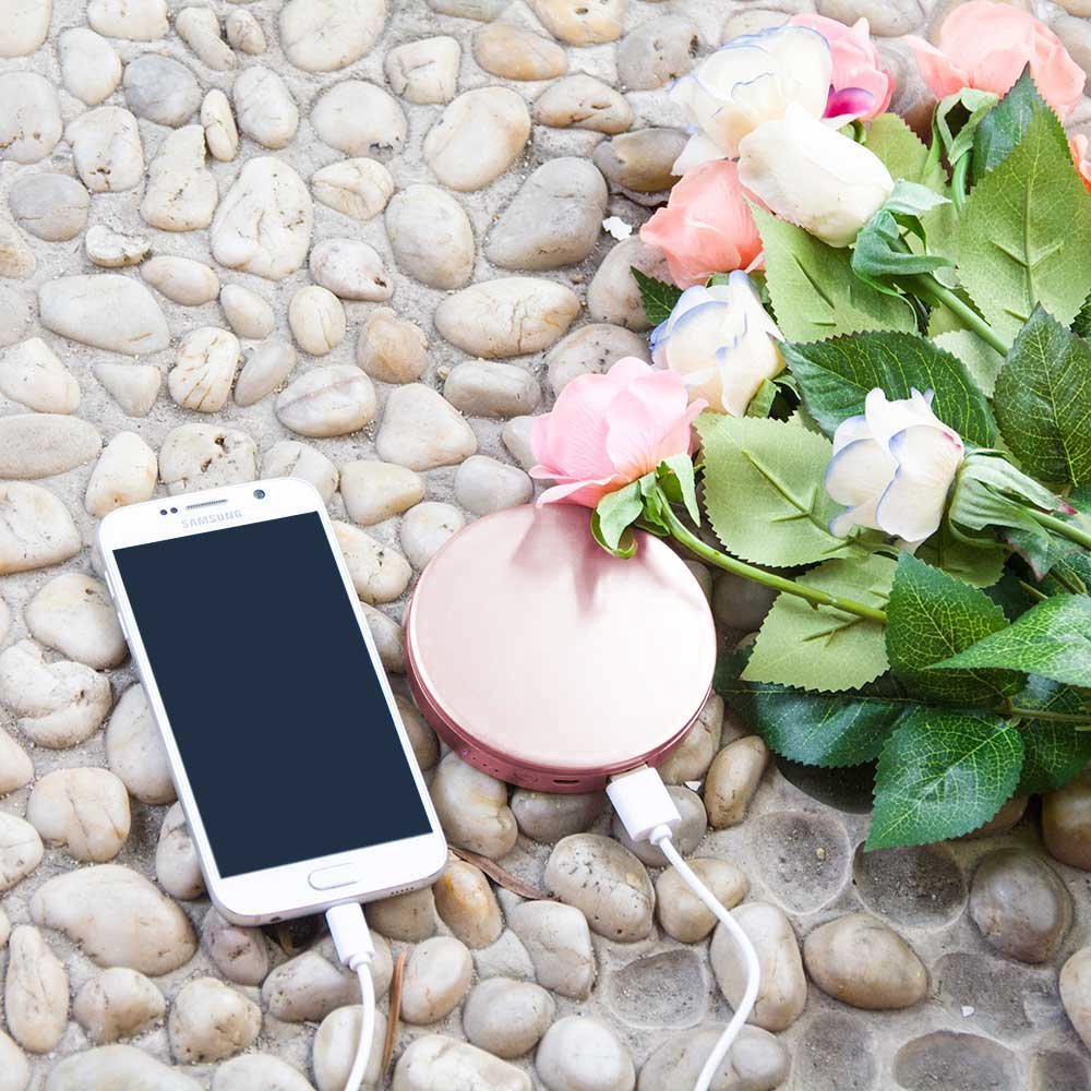 Practical holiday gifts for teachers: A USB phone charger that doubles as a compact mirror.