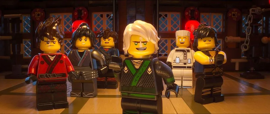Oliva Munn giving ninja lessons to Sage at the LEGO NINJAGO Movie premiere