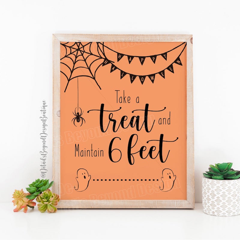 Social distancing signs for candy on Halloween: Take a Treat and Maintain 6 Feet at Details Beyond Design