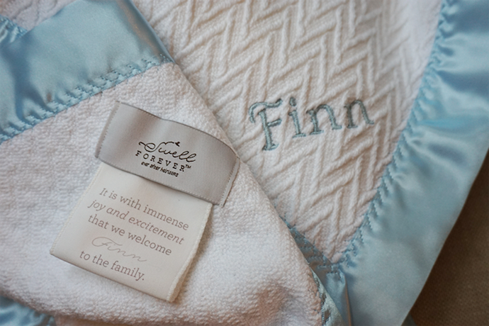 Best adoption gifts: A Swell Forever baby blanket with a custom message