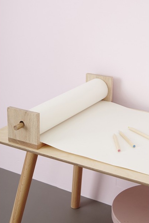 The Pollie shelf holds blank rolls of paper or Playpa preprinted coloring rolls on the wall, or use right on a crafting table