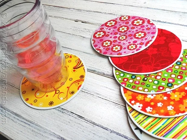 Recycled wine bottle vases from Tater Tots & Jello for Mother's Day