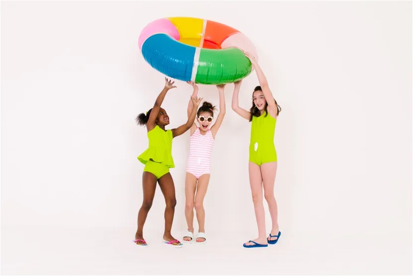 June & January's new swim collection: Girls swimwear in one- and two-piece options.
