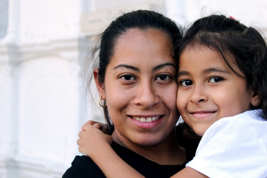 Last-minute Mother's Day gift ideas: A new family photo with her in it. And kids looking happy!