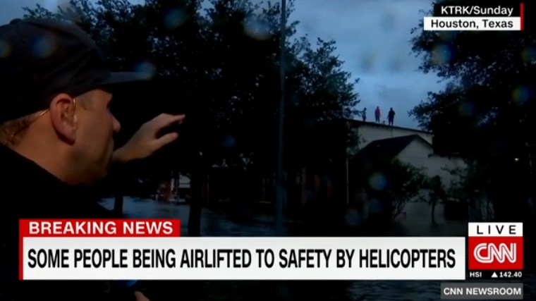 The journalists who are saving lives in and around Houston: A rooftop rescue by Foti Kallergis