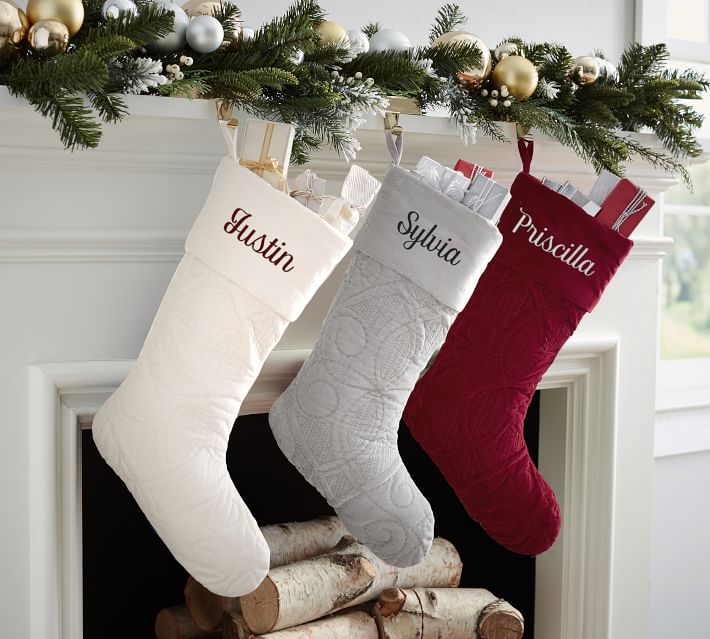 Personalized velvet Christmas stockings at Pottery Barn, now on sale