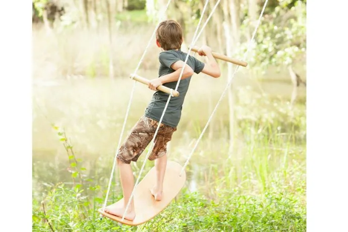 The Swurfer backyard surf-swing for kids
