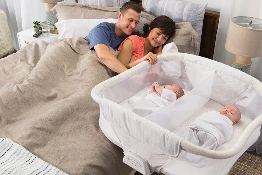 Best gear for twins: Halo Twin Sleeper lets babies sleep together while still having their own space.