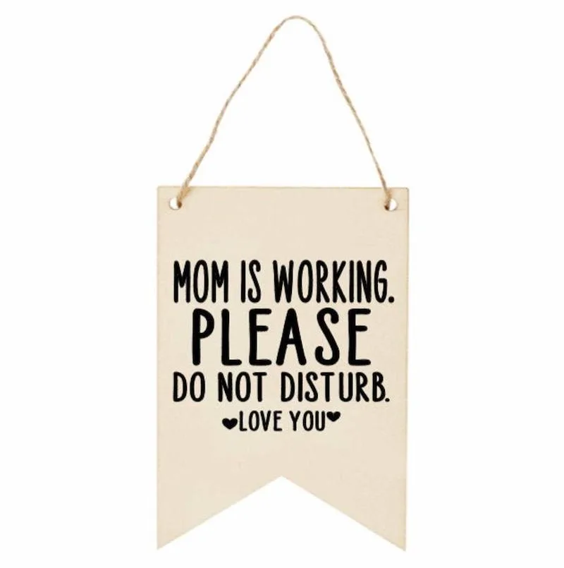 Great home office Mother's Day gifts: "Mom is working" sign at