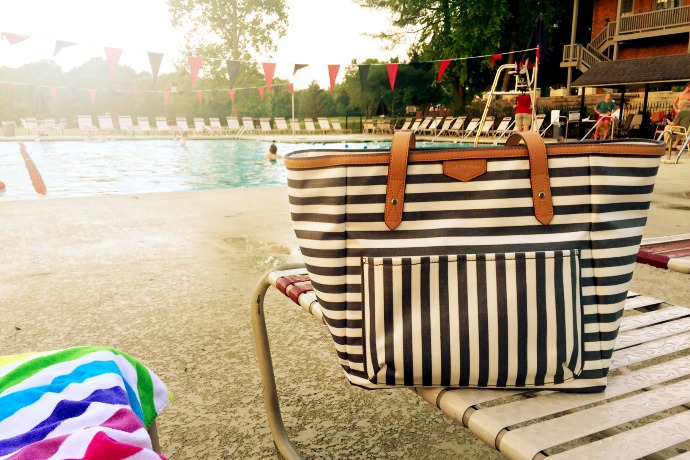 Mom hack for old baby gear: use your waterproof diaper bag as a summer pool tote