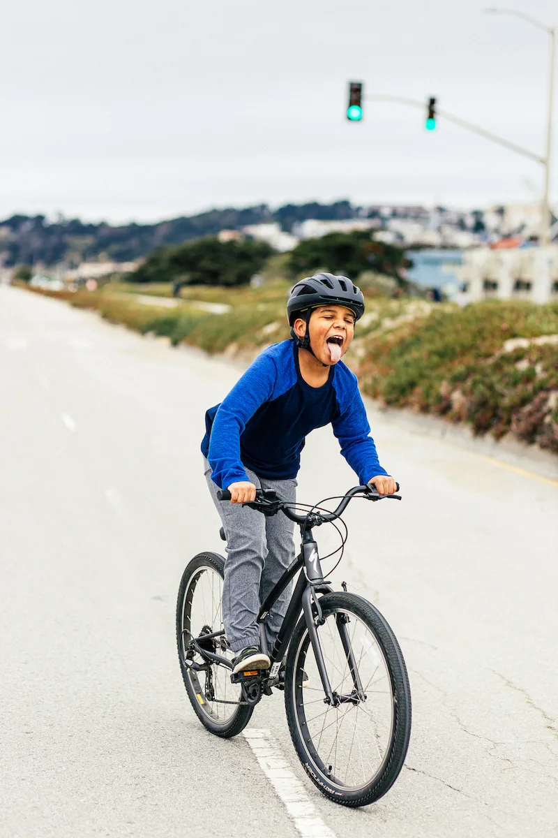 Riding on the new Specialized Jett Bicycle which can be adjustable to grow with kids