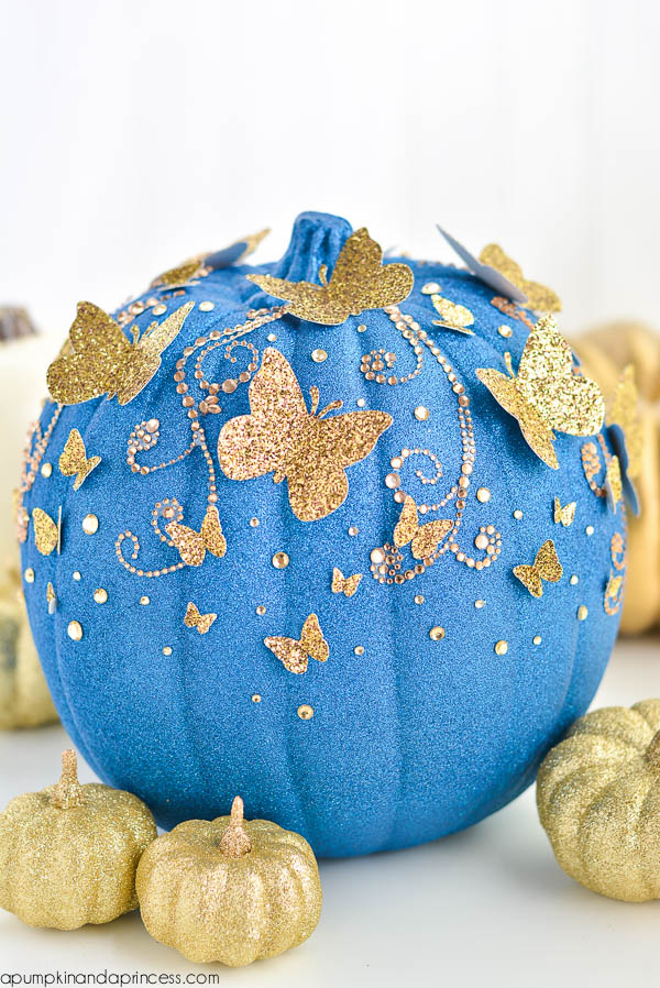 Teal pumpkin decorating ideas: Adapt this DIY for a Cinderella Butterfly Pumpkin from A Pumpkin and A Princess using teal instead of royal blue