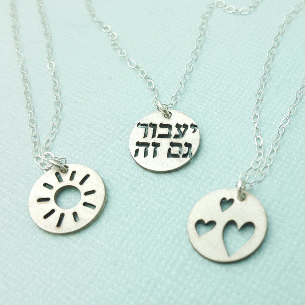 Best Hanukkah gifts from small businesses: %22This too shall pass%22 Hebrew letter necklace from Emily J Design