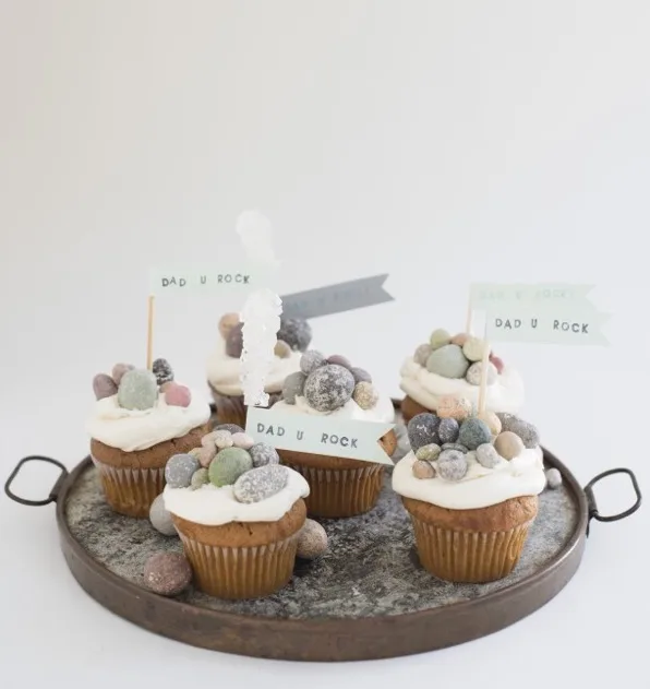 Top cupcakes with chocolate rocks for an easy Father's Day edible craft from Oh Happy Day!