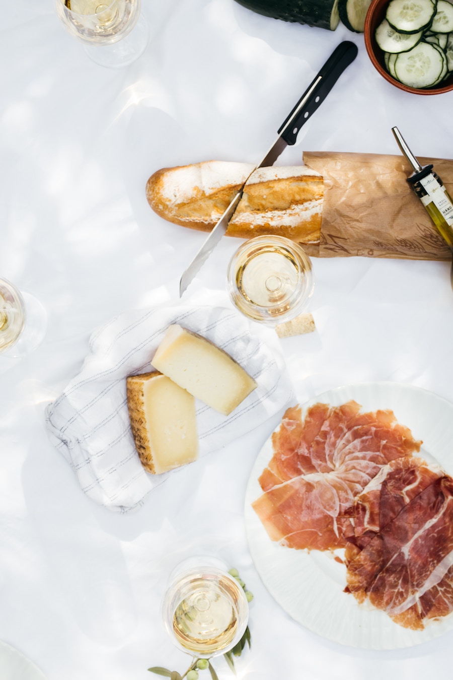At home date-night ideas: Wine and cheese tasting | Photo by Ingrid Hofstra via Unsplash