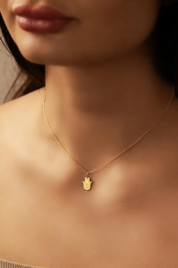 Symbolic keepsake jewelry for graduates: An aquamarine teardrop necklace from the Last Line, providing protection through life's storms