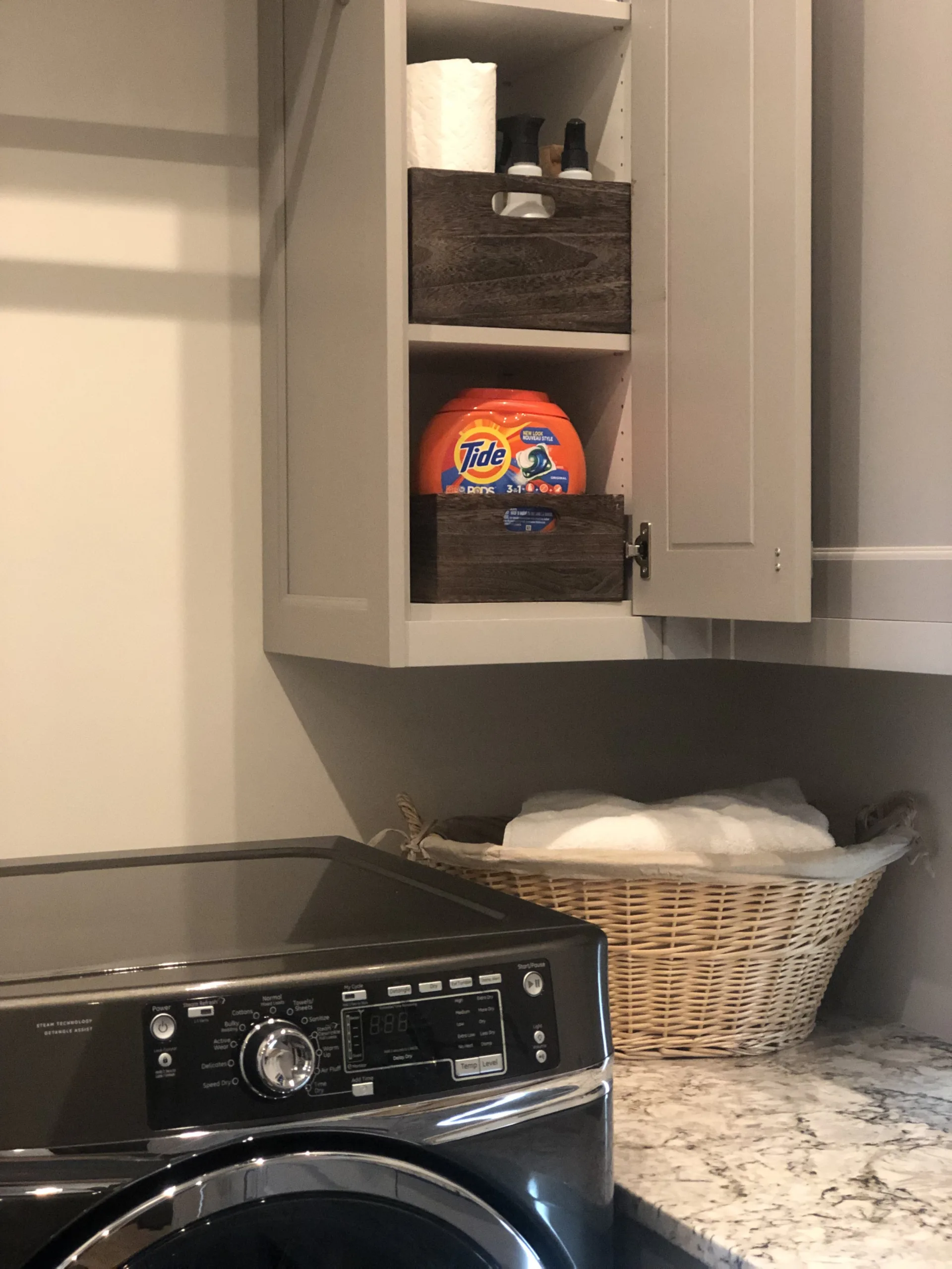 Tips for a quick, easy laundry room makeover: Use baskets and bins that match your decor